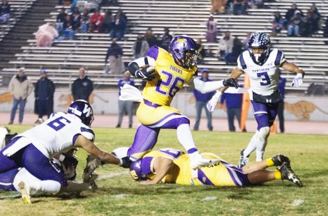 Lemoore's Anthony Garcia with a seven-yard touchdown run in the big 64-8 playoff victory over visiting Washington Union.